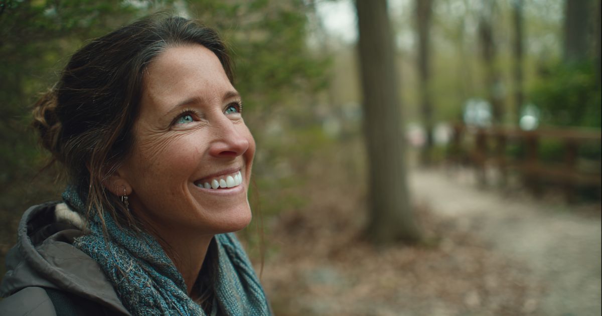 A woman in her 40s relaxing after getting ketamine therapy for OCD in Westport, CT, at Mindflow Therapy.